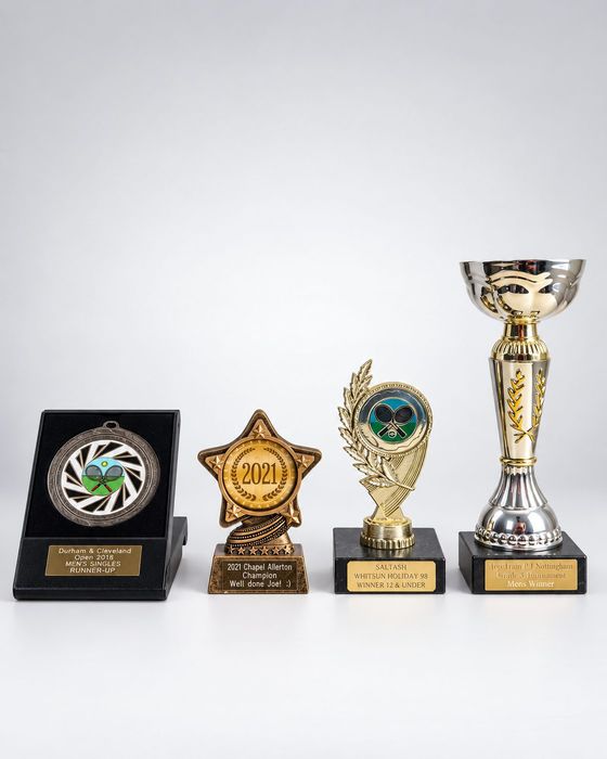 Joe Jeynes tennis trophies — Chapel Allerton Club Champion 2021 and Top Train Nottingham Grade 3 Winner